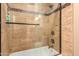 Bathroom with a shower/tub combo and glass enclosure at 7830 S 64Th Ln, Laveen, AZ 85339