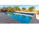 Cool off in this inviting swimming pool, perfect for summer relaxation at 26086 W Cat Balue Dr, Buckeye, AZ 85396