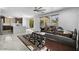 Bright living room with a ceiling fan, comfortable seating, and an area rug at 3535 E Melody Ln, Gilbert, AZ 85234