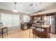 Modern kitchen with island, stainless steel appliances, and ample cabinet space at 813 E Lovegrass Dr, San Tan Valley, AZ 85143