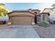 Charming single-story home with a two-car garage at 813 E Lovegrass Dr, San Tan Valley, AZ 85143