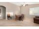 Cozy dining area with a table and four chairs at 813 E Lovegrass Dr, San Tan Valley, AZ 85143