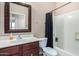Clean bathroom with tub, shower, and vanity at 813 E Lovegrass Dr, San Tan Valley, AZ 85143