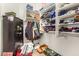 Spacious closet with shelving and hanging space for clothes and storage at 813 E Lovegrass Dr, San Tan Valley, AZ 85143