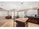 Well-equipped kitchen with a breakfast bar and ample counter space at 813 E Lovegrass Dr, San Tan Valley, AZ 85143