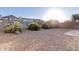 Backyard with gravel and some plants at 813 E Lovegrass Dr, San Tan Valley, AZ 85143