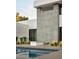 Modern pool and patio area with fire pit and landscaping at 5939 E Orange Blossom Ln, Phoenix, AZ 85018