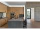 Modern kitchen with light wood cabinets, concrete countertops, and island at 5939 E Orange Blossom Ln, Phoenix, AZ 85018
