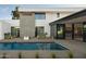 Clean lines and a relaxing pool with spa area at 5939 E Orange Blossom Ln, Phoenix, AZ 85018
