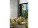 Landscaped area with gravel and ornamental grasses at 5939 E Orange Blossom Ln, Phoenix, AZ 85018