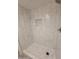 Updated shower with marble-style tile and pebble floor at 1942 S Emerson -- # 131, Mesa, AZ 85210