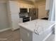 Modern kitchen with stainless steel appliances and white cabinets at 1942 S Emerson -- # 131, Mesa, AZ 85210