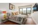 Bright bedroom with large windows and hardwood floors at 6311 E Phoenician Blvd # 18, Scottsdale, AZ 85251
