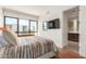 Bedroom with ensuite bathroom and hardwood floors at 6311 E Phoenician Blvd # 18, Scottsdale, AZ 85251