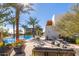 Relaxing pool area with lounge chairs and seating at 6311 E Phoenician Blvd # 18, Scottsdale, AZ 85251