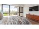 Bedroom with stunning views and mid-century dresser at 6311 E Phoenician Blvd # 18, Scottsdale, AZ 85251