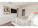 Bedroom with hardwood floors and large windows at 6311 E Phoenician Blvd # 18, Scottsdale, AZ 85251