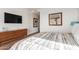 Bright bedroom with large window and hardwood floors at 6311 E Phoenician Blvd # 18, Scottsdale, AZ 85251