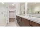 Modern bathroom with marble vanity, glass shower, and ample storage at 6311 E Phoenician Blvd # 18, Scottsdale, AZ 85251