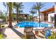 Inviting community swimming pool with surrounding patio at 6311 E Phoenician Blvd # 18, Scottsdale, AZ 85251