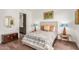 Bedroom with ensuite bathroom and hardwood floors at 6311 E Phoenician Blvd # 18, Scottsdale, AZ 85251