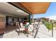 Spacious patio with outdoor dining set and stunning golf course views at 6311 E Phoenician Blvd # 18, Scottsdale, AZ 85251