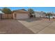 Attached garage with driveway at 8841 W Minnezona Ave, Phoenix, AZ 85037