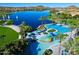 Aerial view of community pool and lake at 9520 S Krista W Dr, Goodyear, AZ 85338