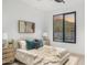 Bedroom with a view of the pool and mountains at 9520 S Krista W Dr, Goodyear, AZ 85338
