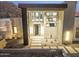 Front entrance of a contemporary home with a sleek design at 9520 S Krista W Dr, Goodyear, AZ 85338
