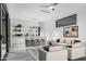 Modern home bar with seating, perfect for entertaining at 9520 S Krista W Dr, Goodyear, AZ 85338