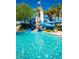 Resort-style pool with waterslides and lighthouse feature at 9520 S Krista W Dr, Goodyear, AZ 85338