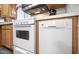 White oven, stovetop and dishwasher in kitchen at 158 Limestone Dr, Apache Junction, AZ 85119