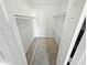 Large walk-in closet with double hanging rods and shelving at 3810 N Maryvale Pkwy # 1070, Phoenix, AZ 85031