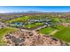 Aerial view of a large community pool with surrounding landscape at 28602 N Summit Springs Rd, Rio Verde, AZ 85263