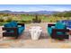 Relaxing patio with stunning mountain views and comfortable seating at 28602 N Summit Springs Rd, Rio Verde, AZ 85263