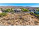 Aerial view of vacant lot next to luxury homes with mountain views at 28602 N Summit Springs Rd, Rio Verde, AZ 85263