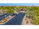 Entrance to Trilogy luxury community with guardhouse and landscaping at 28602 N Summit Springs Rd, Rio Verde, AZ 85263