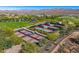 Aerial view of community tennis courts with mountain backdrop at 28602 N Summit Springs Rd, Rio Verde, AZ 85263