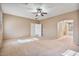 Main bedroom with ensuite bathroom access at 9237 W Alex Ave, Peoria, AZ 85382