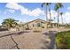Home's backyard features a large covered patio and a gravel area with desert landscaping at 3507 N Snead Dr, Goodyear, AZ 85395