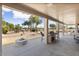 Outdoor patio with built-in grill and fire pit at 3507 N Snead Dr, Goodyear, AZ 85395