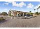 Backyard patio with covered seating area, and fountain at 3507 N Snead Dr, Goodyear, AZ 85395