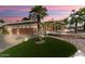 Stunning desert home with three-car garage and manicured lawn at 3507 N Snead Dr, Goodyear, AZ 85395