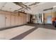 Bright and airy three-car garage, featuring built-in storage and high ceilings at 3507 N Snead Dr, Goodyear, AZ 85395