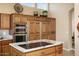 Spacious kitchen with granite countertops and stainless steel appliances at 3507 N Snead Dr, Goodyear, AZ 85395