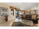 Open living area with view of kitchen and access to patio at 3507 N Snead Dr, Goodyear, AZ 85395
