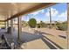Covered patio with seating area and a view of the backyard at 3507 N Snead Dr, Goodyear, AZ 85395