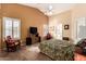 Spacious main bedroom with high ceilings and a ceiling fan at 40710 N Boone Ln, Anthem, AZ 85086