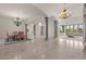 Elegant dining room with chandelier and seating for eight at 4723 E Foothill Dr, Paradise Valley, AZ 85253